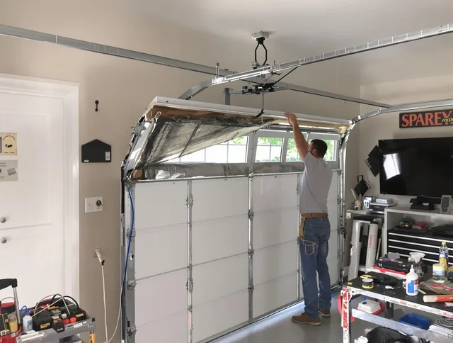Garage door section replacement by Wallingford Garage Door Repair in Wallingford